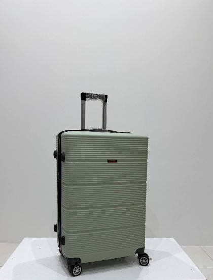 چمدان زده دار دسینی سایز متوسط سبز