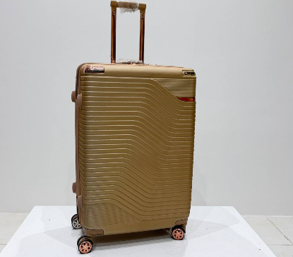تصویری از چمدان زده دار منزا سلطنتی سایز بزرگ طلایی